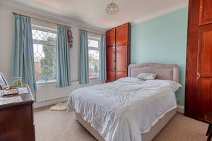 Bedroom One- click for photo gallery